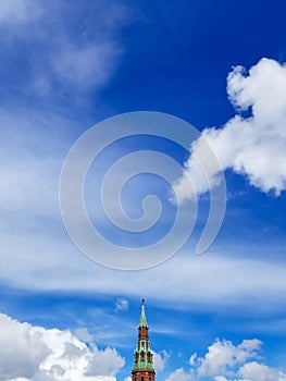 Blue sky background with Moscow Kremlin tower from the bottom