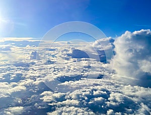 Blue sky background with tiny clouds