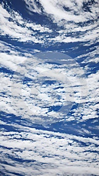 blue sky background with tiny clouds, nature series, closeup of photo.