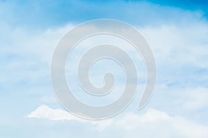 The sky is a small cloud floating in the sky.