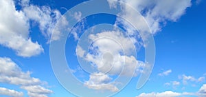 Blue sky background with white clouds