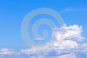 Blue sky background with white clouds, rain clouds on sunny summer or spring day