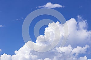 Blue sky background with white clouds, rain clouds on sunny summer or spring day