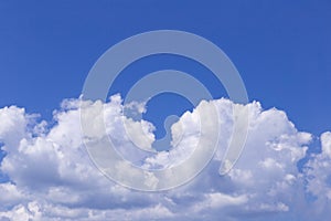 Blue sky background with white clouds, rain clouds on sunny summer or spring day