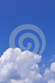 Blue sky background with white clouds, rain clouds on sunny summer or spring day