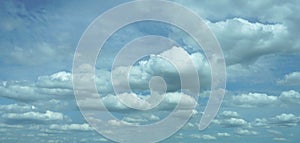 A blue sky backgrounds and textues with a white clouds