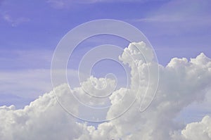Blue sky with big clouds close up background image