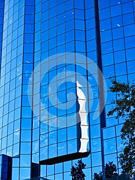 Blue Sky and Building Reflections on Glass Windows