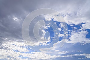 Blue sky with close up white fluffy tiny clouds background and p