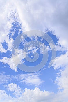 Blue sky with close up white fluffy tiny clouds background and p