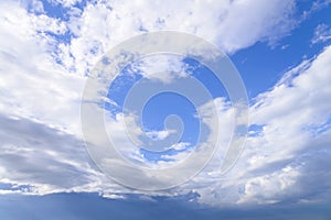 Blue sky with close up white fluffy tiny clouds background and p