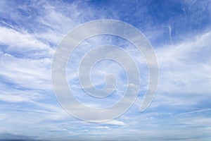 Blue sky with close up white fluffy tiny clouds background and p