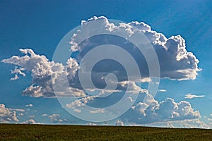 Blue sky and cloud with bright sun above ground star flare background