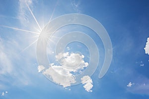 Blue sky and cloud with bright sun star flare background