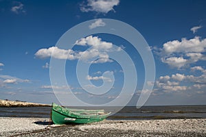 Blue sky cloud green boat