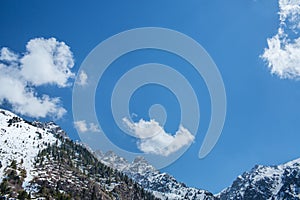 Blue sky and cloud mountains in Almaty, Kazakhstan, Medeo