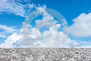 Blue sky cloud with stone rock wall nature background