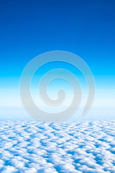 Blue sky and Cloud Top view from airplane window,Nature backgrou