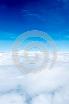 Blue sky and Cloud Top view from airplane window,Nature backgrou