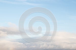 Blue sky with clouds background with soft focus. Empty sky background for your design. Spring background