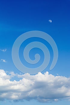 Blue sky with clouds and moon background