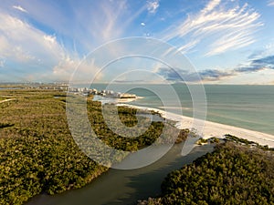 Blue sky with clouds over Bonita Beach in Florida from an aerial view photo