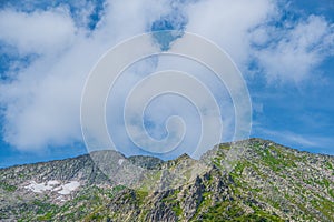 Blue sky and clouds over the rocks