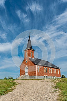 Blue sky and clouds over St. Johns Lutheran Church near Regina, SK