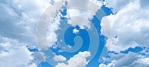 Blue sky, cloudscape background banner panorama , with clouds and sun