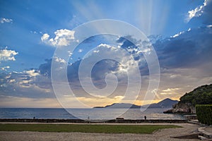 Blue sky and colorful clouds at sunset over Adriatic sea