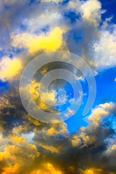 the blue sky with colorful cumulus clouds at sunset photo