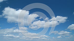 Blue sky cumulus and stratocumulus clouds. Scenic aerial background of blue sky with cumulus clouds. Clean azone layer