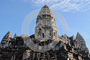 Blue sky day at Angkor Wat\'s stone tower