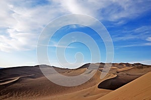 Blue sky and dune