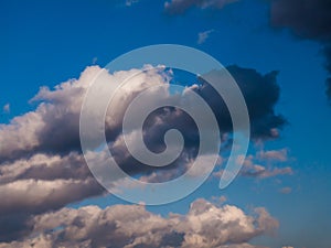 Blue sky with fluffy clouds