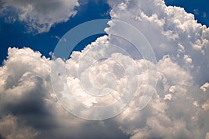 Blue sky with fluffy clouds