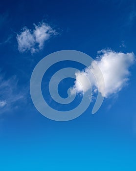 Blue sky with fluffy white clouds