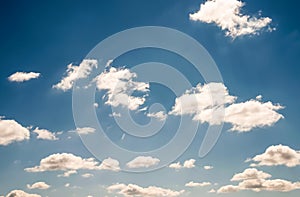 Blue sky with fluffy white clouds