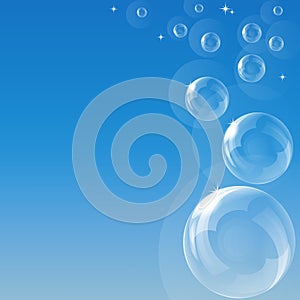 Blue sky with flying soap bubbles.