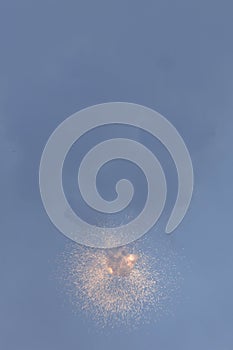 Blue sky full of fireworks exploding