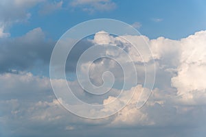 Blue sky full of fluffy clouds, shot at bright sunny summer day