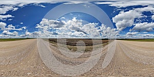 blue sky hdri 360 panorama with awesome clouds on gravel road among fields in spring day in equirectangular full seamless