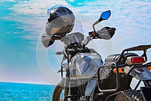 blue sky  and high speed bike,bike and helmet,Part of motorcycle  headlight. Detail of Motorbike