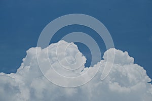 Blue sky with large white clouds