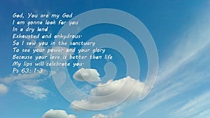 Blue sky with a message from the Bible. One of the David`s Psalms devoted to God.