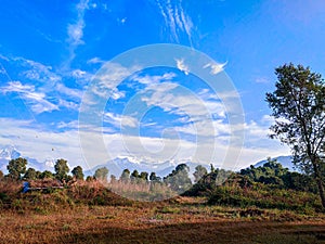 Blue sky mountains forest and grassland all in one picture. Beautiful landscape Pokhara Nepal