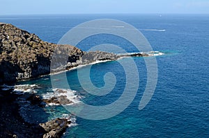 Blue sky, mountains and ocean
