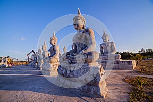 Blue sky over buddha statues
