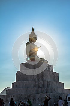Blue sky over buddha statues
