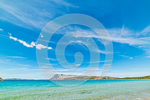 Blue sky over Capo Coda Cavallo coastline photo